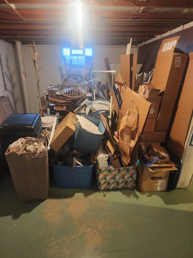 Roll-off dumpster container at job site for Roll Off Dumpster Rental in Greene